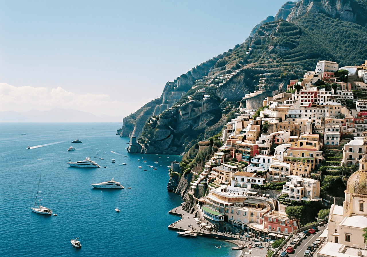 Amalfi cliffside village above turquoise Mediterranean waters