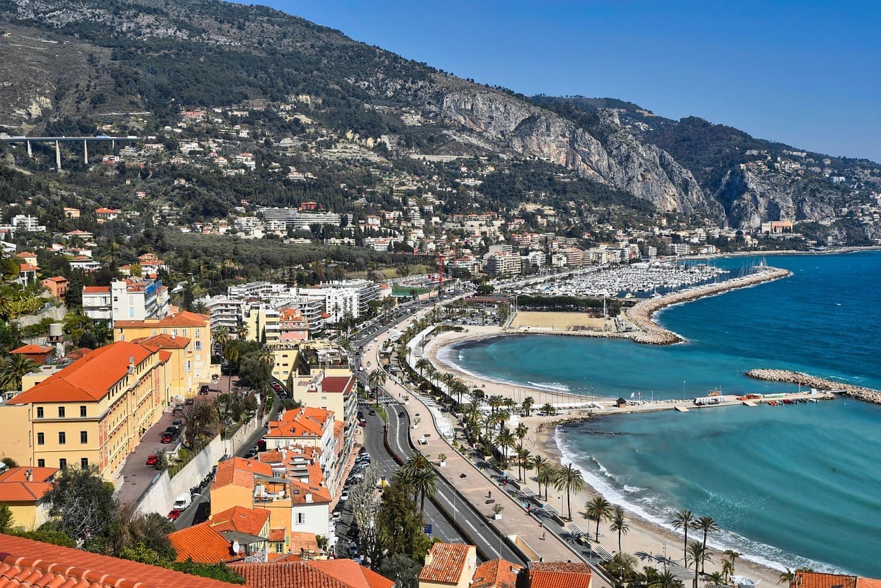 Glamorous French Riviera coastline with azure Mediterranean waters and sun-drenched promenades